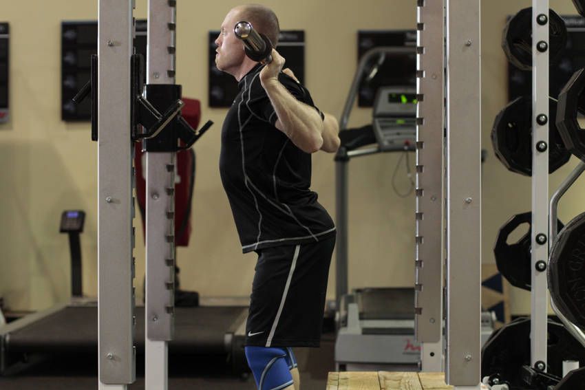 Box Squat exercise demonstration, targeting the quads