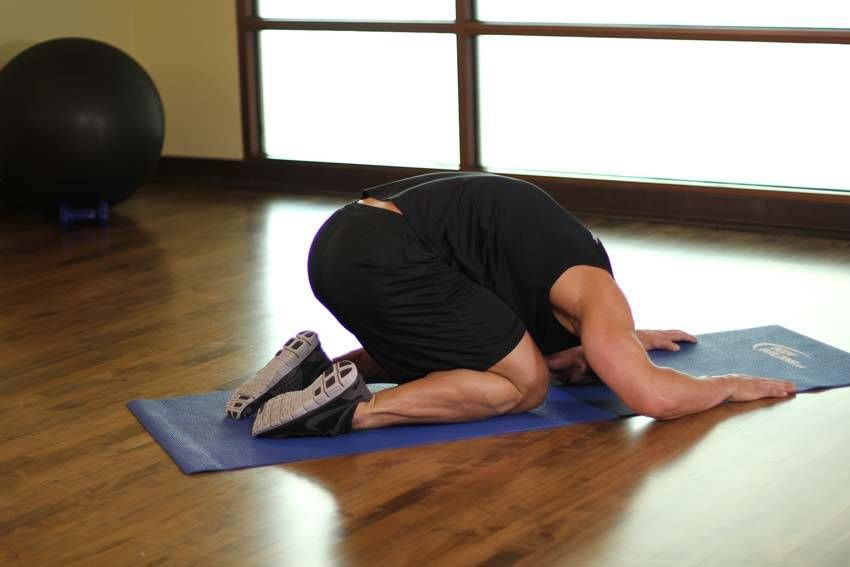 Child's Pose exercise demonstration, targeting the back