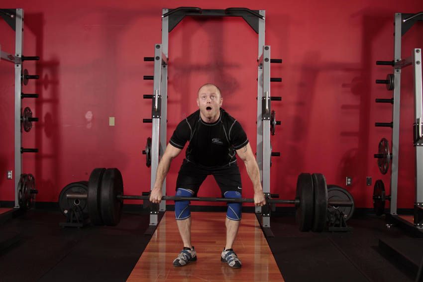 Clean and Jerk exercise demonstration, targeting the quads