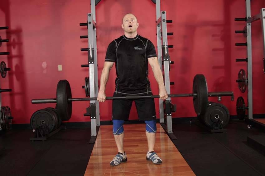 Hang Clean exercise demonstration, targeting the quads