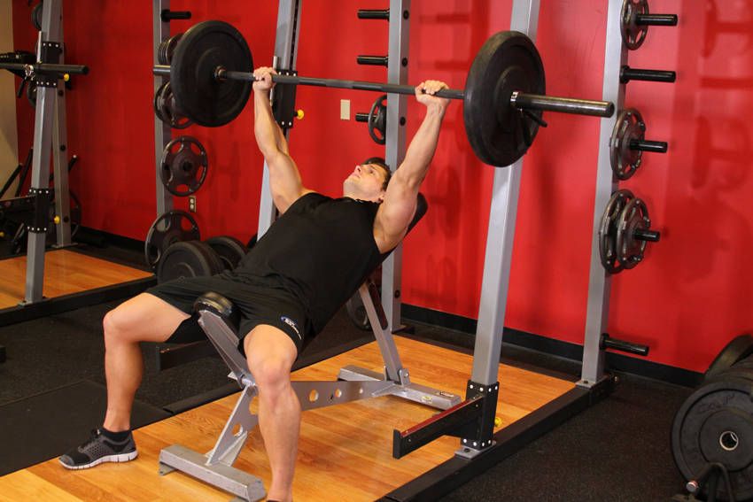 Incline Barbell Bench Press exercise demonstration, targeting the chest