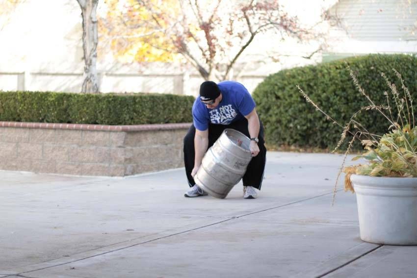 Keg Load exercise demonstration, targeting the back