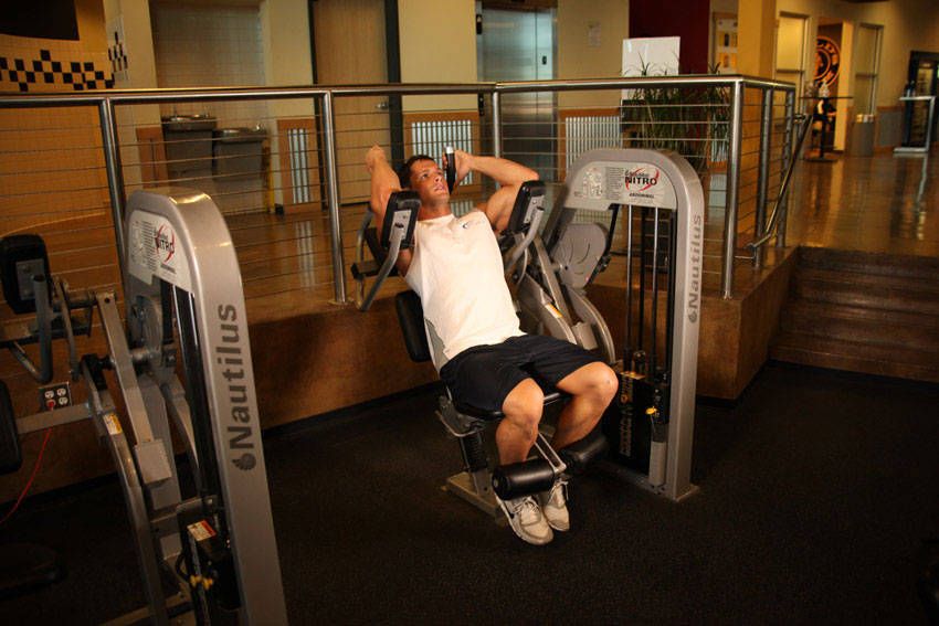 Machine Crunch exercise demonstration, targeting the abs