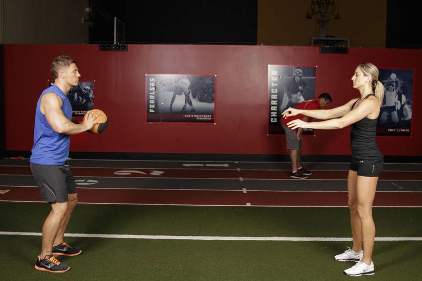 Medicine Ball Chest Pass exercise demonstration, targeting the chest