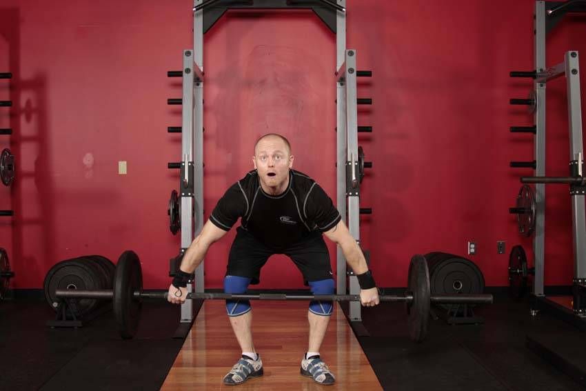 Muscle Snatch exercise demonstration, targeting the traps