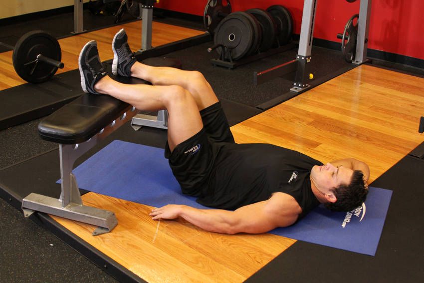 Oblique Crunch exercise demonstration, targeting the obliques