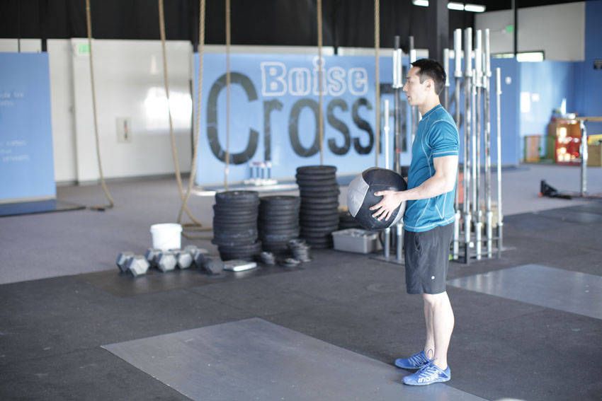 Overhead Medicine Ball Throw exercise demonstration, targeting the shoulders