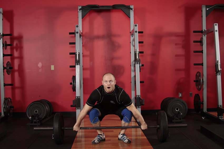 Power Snatch exercise demonstration, targeting the quads