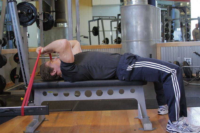 Skull Crusher exercise demonstration, targeting the triceps