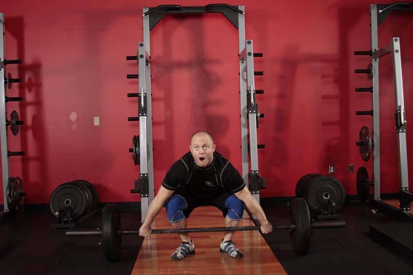 Snatch exercise demonstration, targeting the quads