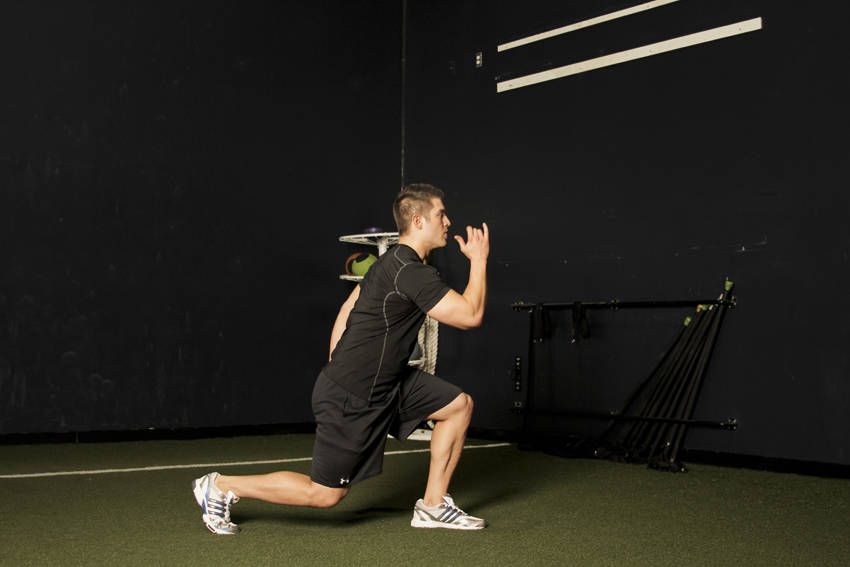 Split-Squat Jump exercise demonstration, targeting the quads