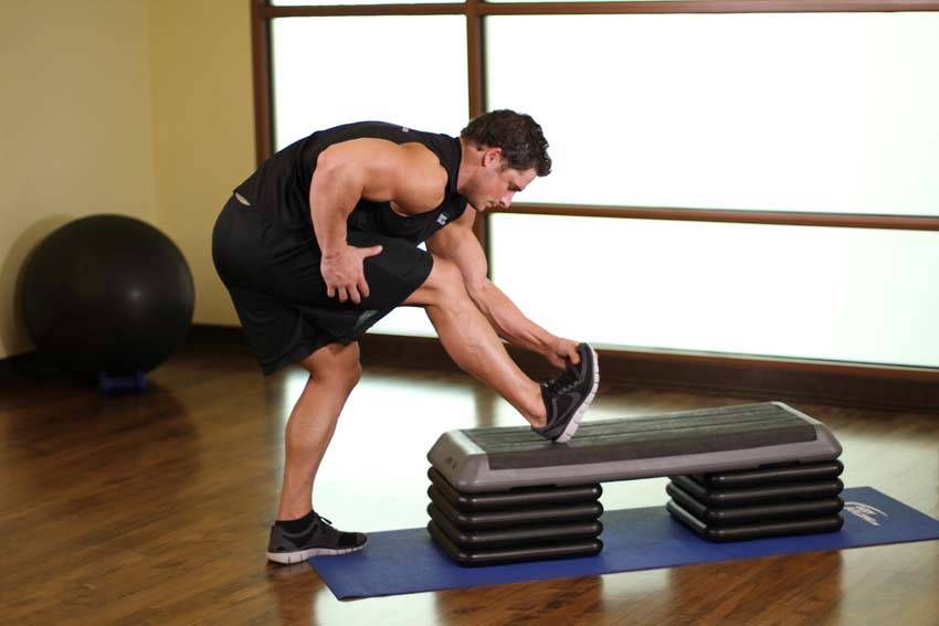 Standing Calf Stretch exercise demonstration, targeting the calves