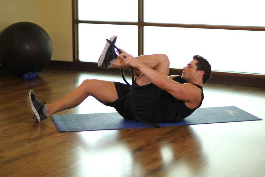 Standing Quad Stretch exercise demonstration, targeting the quads